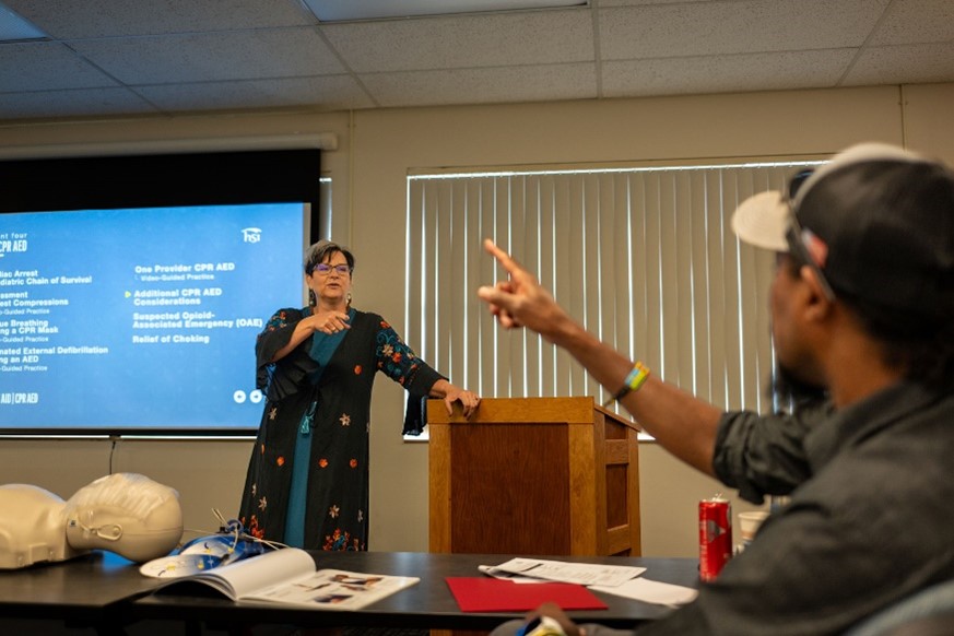 A woman teaching a class